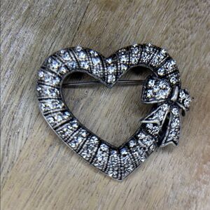 Ornate silver Pewter heart with rhinestone and bow brooch